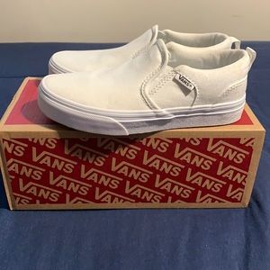 White Vans kid sneakers